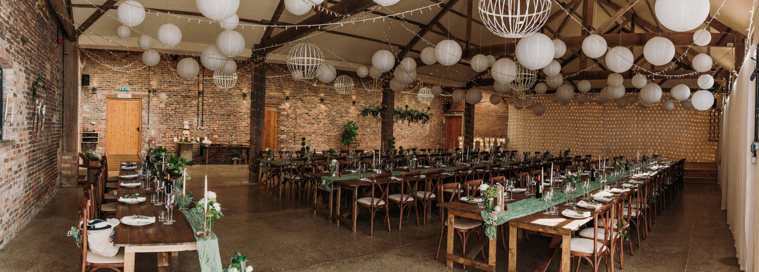 The Main Barn laid out for the wedding breakfast