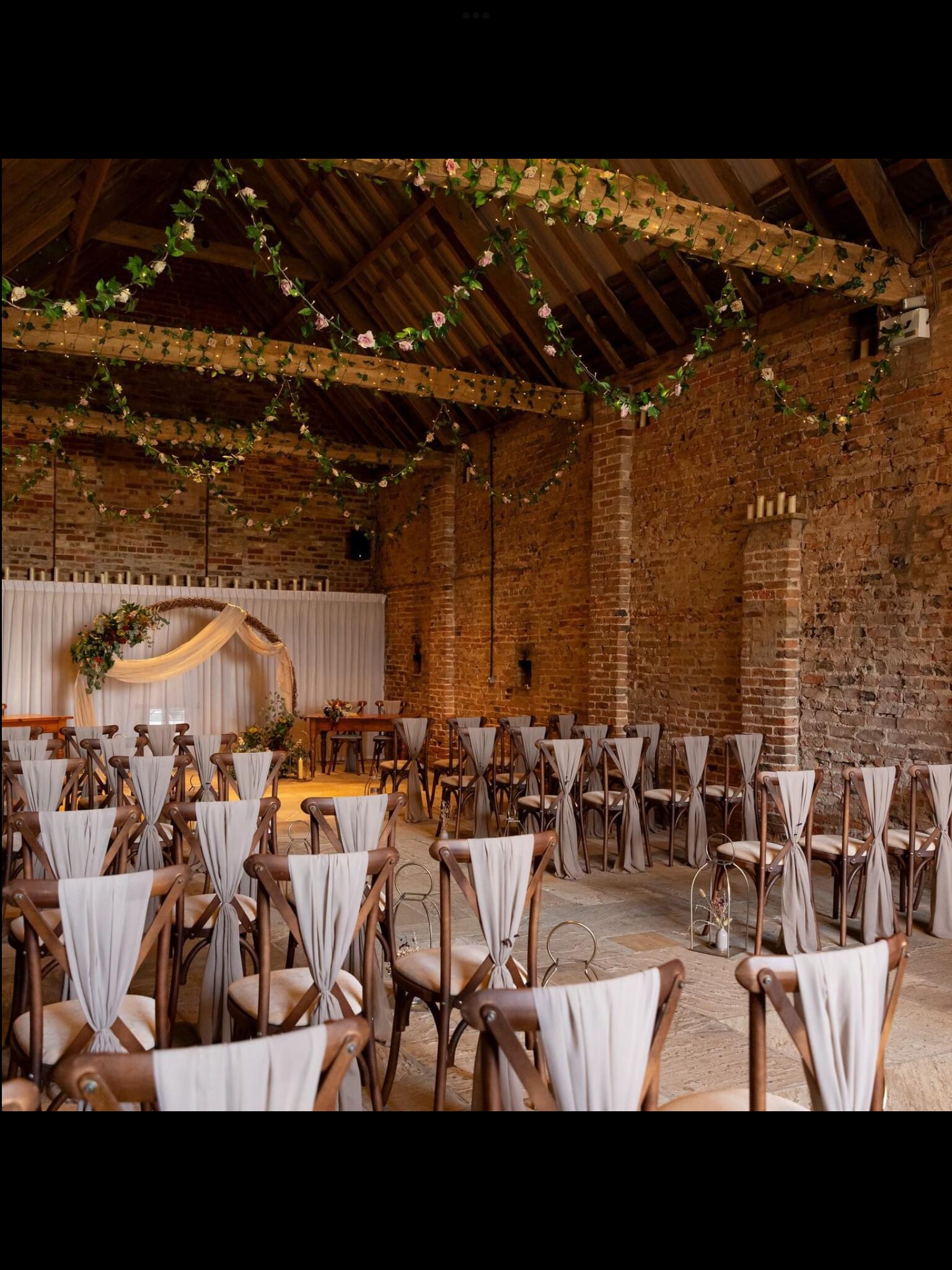 A barn dressed for a wedding ceremony at Barmbyfield